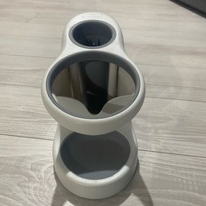 Hair straightener and blow dryer holder.